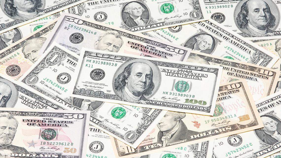 Heap of dollars, money background Getty Images | Royalty Free