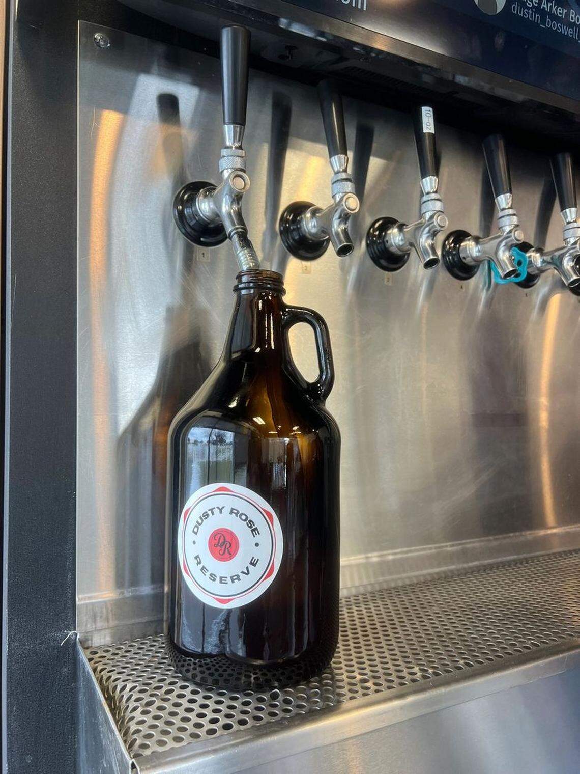 Like its predecessor, Dusty Rose Reserve will fill growlers. “I have nothing but respect for the Growler Guys,” new owner Amanda Mumford says.