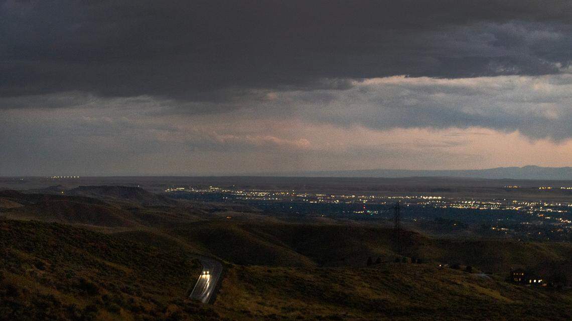 A storm over the Boise area is viewed from Bogus Basin Road, Tuesday, Aug. 22, 2023.