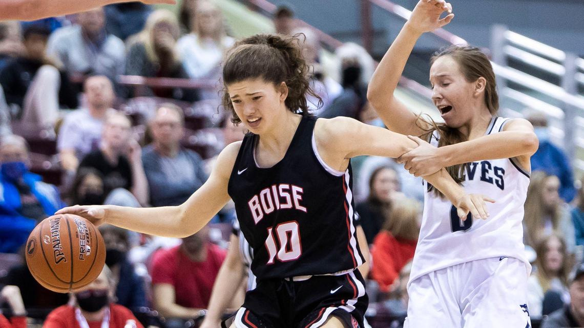 Lake City senior Kendall Pickford fouls Boise’s Ella Nelson in the fourth quarter of their 5A girls basketball state semifinal Friday at the Ford Idaho Center in Nampa. Boise cruised to a 45-25 win over No. 1 Lake City.