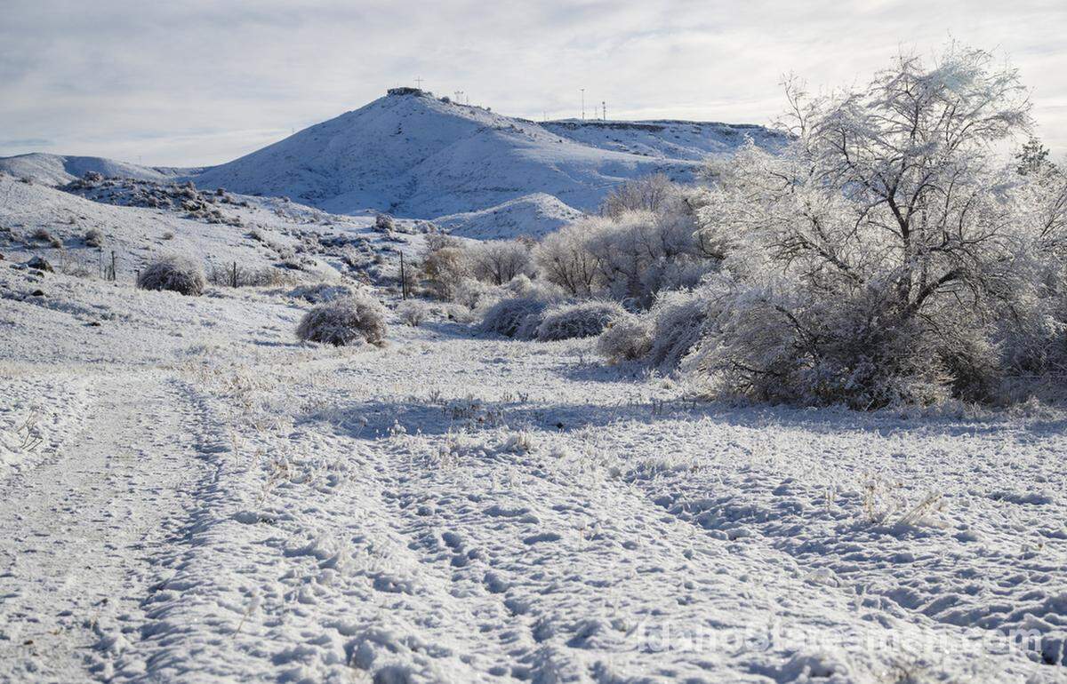 Snow covers Table Rock from the Shoshone-Bannock Trail at Chief Eagle Eye Reserve in Boise on the morning of Dec. 24.