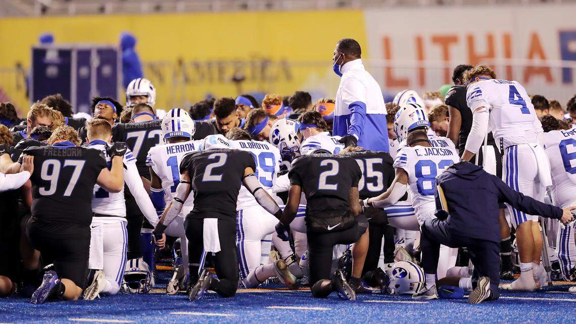 BYU and Boise State football players gathered at midfield for a prayer following the game Nov. 6 at Albertsons Stadium. BYU won 51-17.