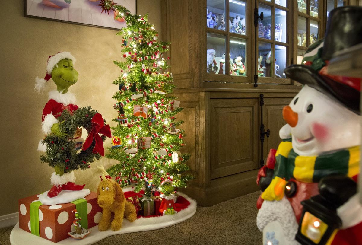 Another favorite is “The Grinch Who Stole Christmas,” so Nikki Gridley devotes a corner of her living room decor to a Grinch-themed tree. The Grinch figure was a gift from Gridley’s daughter.