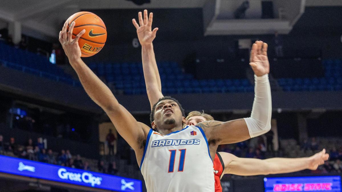 Boise State senior guard Chibuzo Agbo scores in the second half of their basketball game against Western Oregon at ExtraMile Arena at Boise State University, Saturday, Dec. 9, 2023. The Broncos won 109-70.