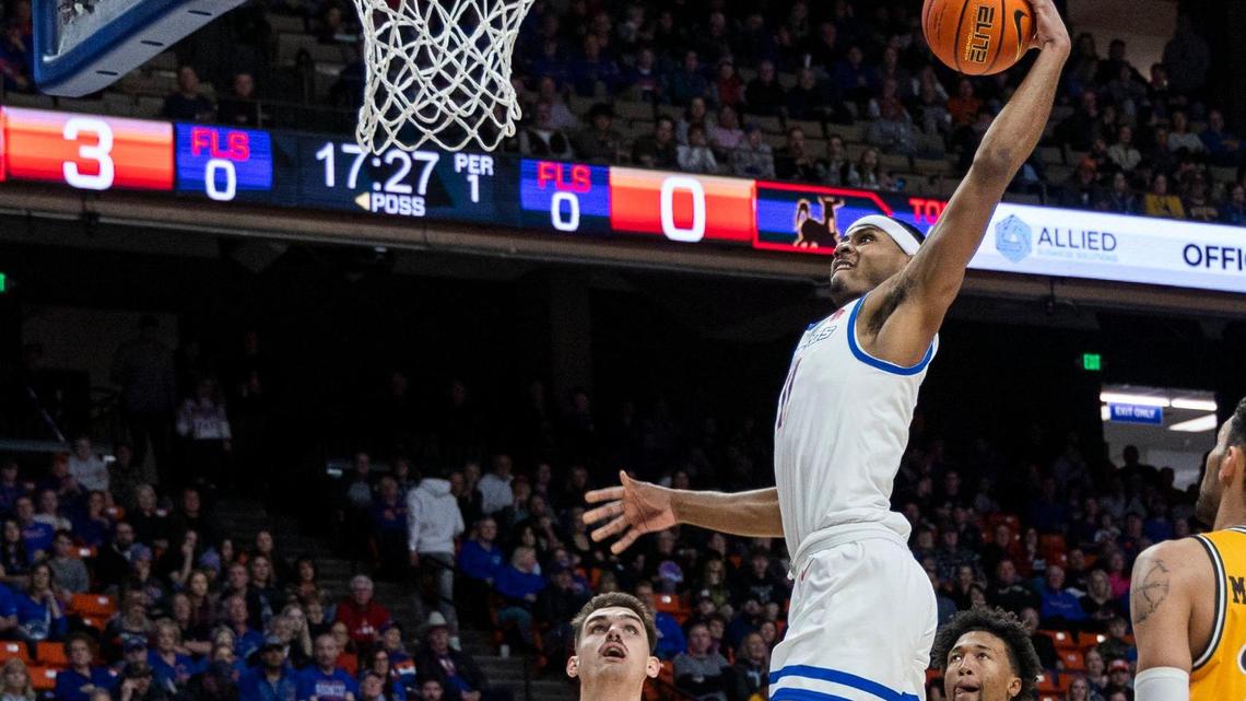Returner Chibuzo Agbo, shown throwing down a dunk against Wyoming last season, and the Boise State men’s basketball team are headed to Canada to play three basketball games this summer.