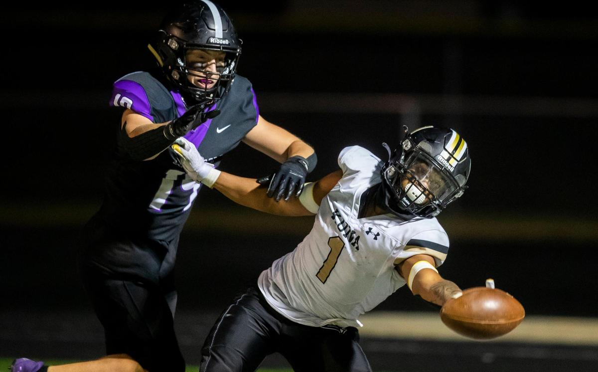 Rocky Mountain’s Brody Swearhart, left, breaks up a pass last fall against Kuna. He returns to lead the Grizzlies’ defense.