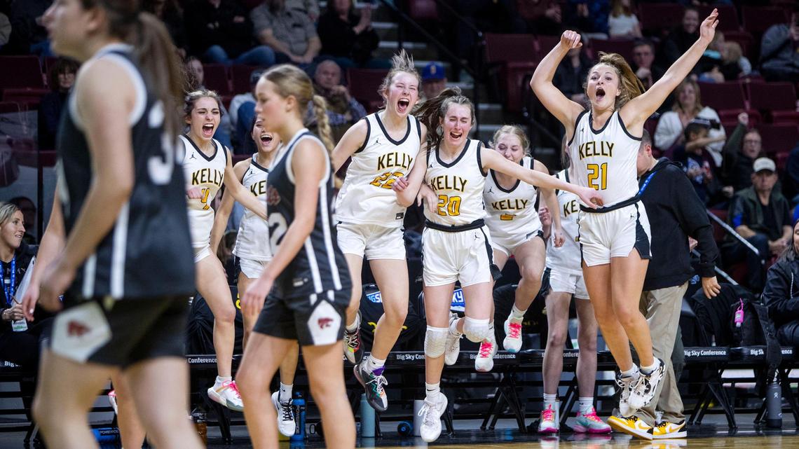 Bishop Kelly celebrates winning the 4A District Three girls basketball championship with a 46-28 win over Columbia on Thursday at Idaho Central Arena in downtown Boise.