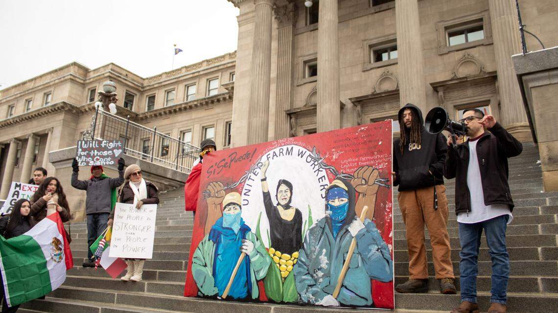 Eddie Melendrez, a Chicano artist, speaks while showcasing his mural for the United Farmworkers of America, a labor union that advocates for farm worker rights as he protested President Donald Trump’s immigration policies in front of the Idaho Capitol in February.