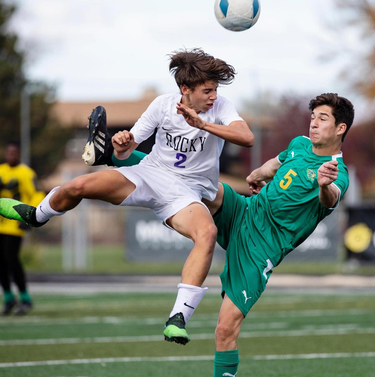 Borah’s Maddux Disdarvic, right, and Rocky Mountain’s Rylan McPherson fight for a ball at the 5A state tournament.