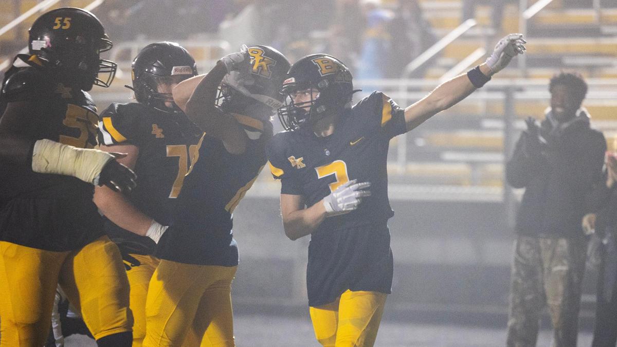 Bishop Kelly senior Cooper Camman celebrates a first-quarter touchdown last week against Emmett.