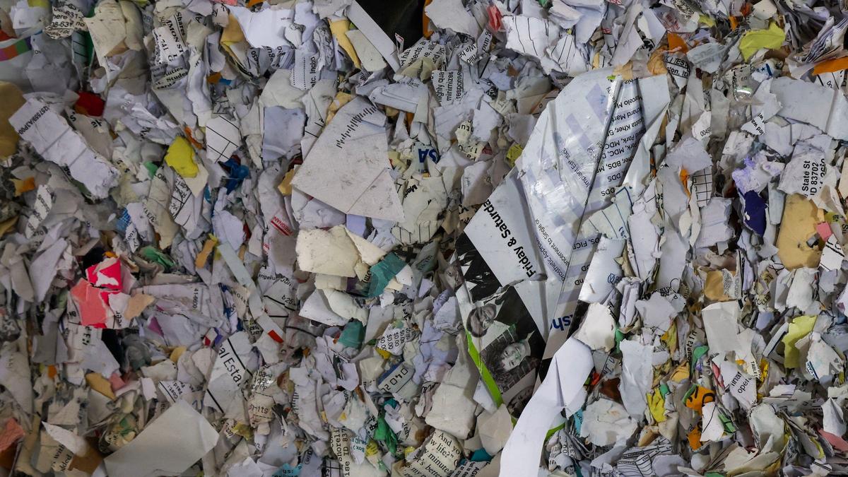 Paper sorted from recycling collection is compressed into large bales at Republic Services Recycling Center on Cole Road in Boise, Friday, March 22, 2024.