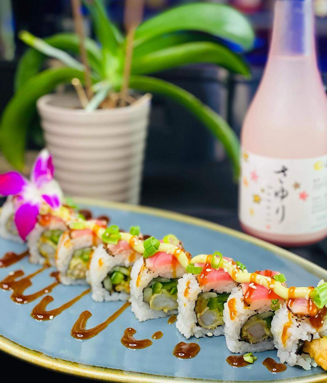 A spicy black peppered ahi tuna roll is one of the menu items.