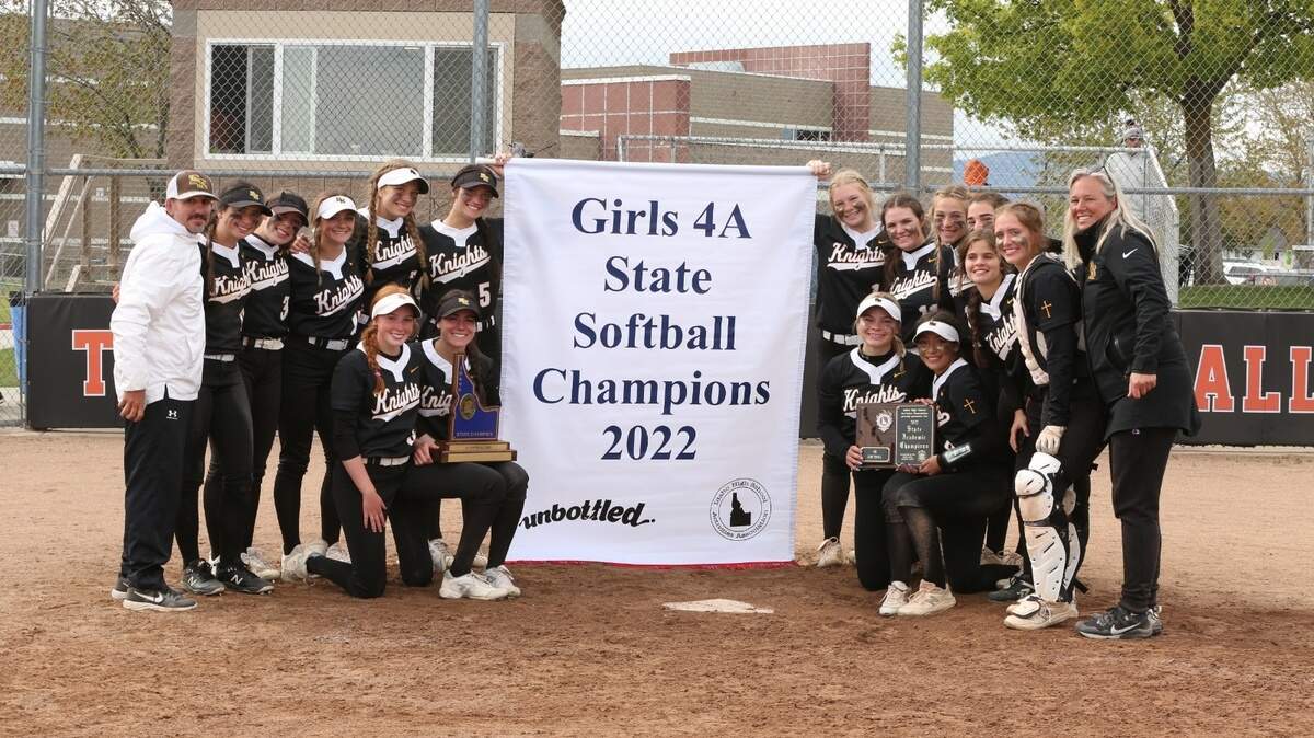 The Bishop Kelly softball team has plenty of experience posing with these types of banners, having done so in 2019, 2021 and now 2022. The COVID pandemic prevented a 2020 state tournament from being played.