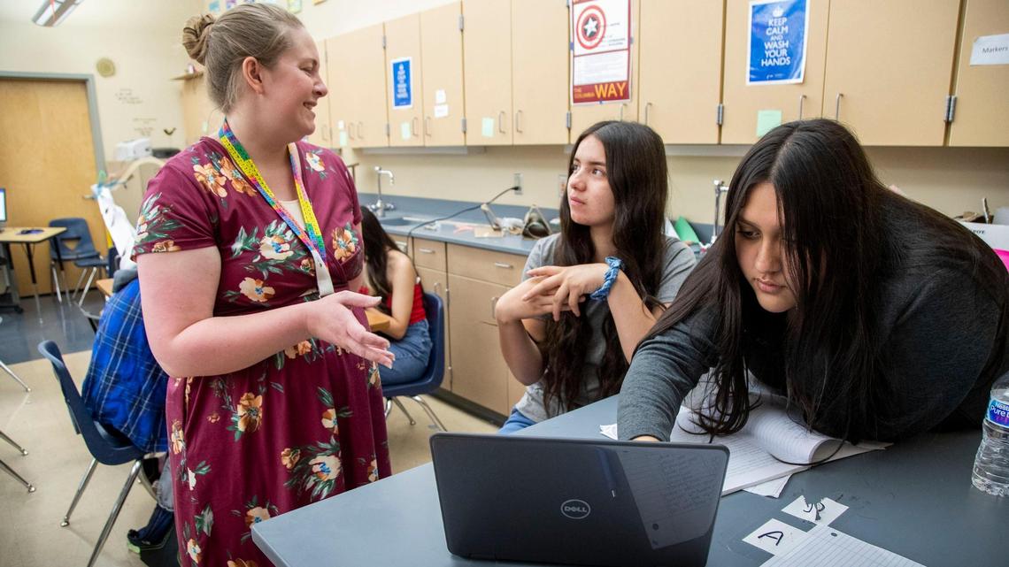 Educator Jamie Martin, left, teaches physical science to Sugey Madrigal, 15, and Yulicsa Robles, 16, during a session of Nampa School District’s summer school program Tuesday, June 22, 2021 at Columbia High School in Nampa. Martin teaches at Gem Prep: Meridian Charter School during the regular school year, but a shortage of faculty has opened positions to out-of-district teachers.