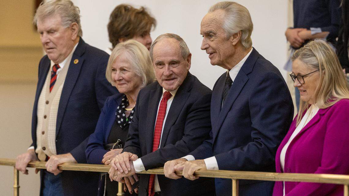 U.S. Sen. Jim Risch, R-Idaho, center, and former Idaho Gov. Dirk Kempthorne, center right, stand to be recognized during the State of the State address at the Idaho Capitol on Monday. From left to right, they are joined by former Gov. Butch Otter, former Idaho first lady Vicki Risch and former Idaho first lady Patricia Kempthorne.