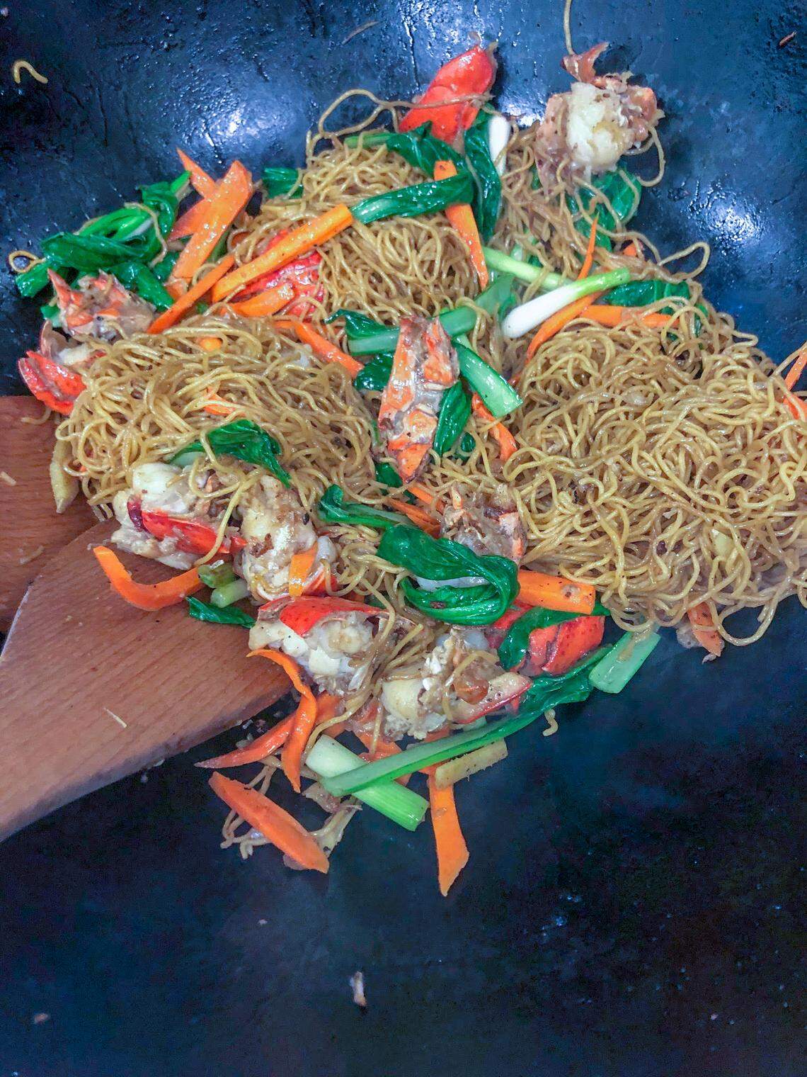 Not in the mood for pho? Dive into stir-fry egg noodle with veggies and lobster at 208 Pho & Vegan.
