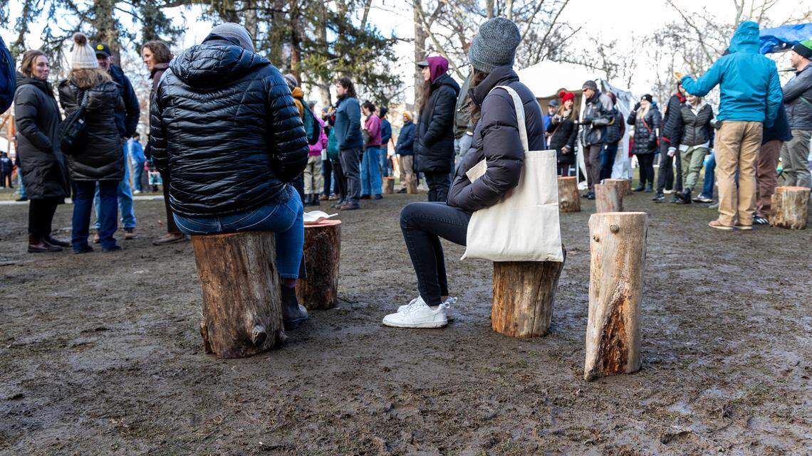Festivalgoers take a load off in Julia Davis Park at Treefort Music Fest.
