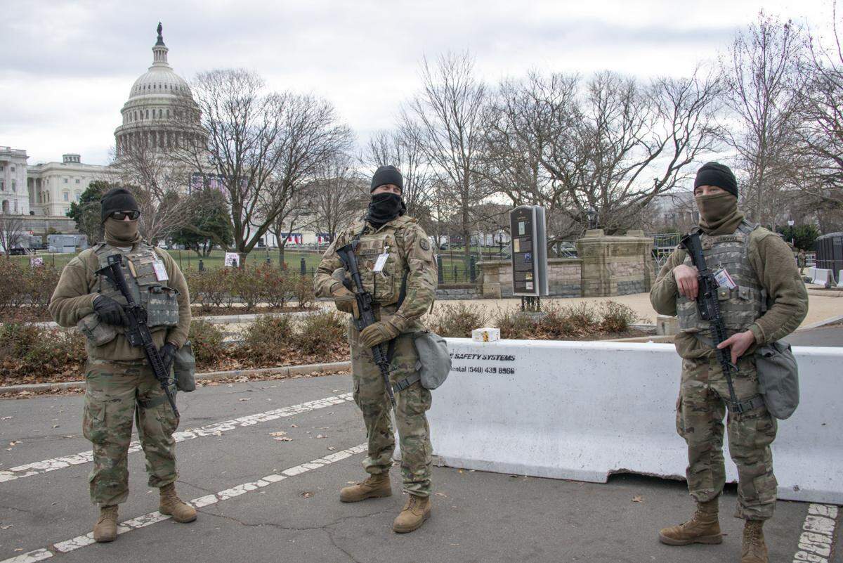 U.S. Army soldiers assigned to the Idaho National Guard’s 2nd Squadron, 116th Cavalry Regiment, 116th Cavalry Brigade Combat Team, stand guard near the Capitol on Jan. 19, in Washington, D.C., to protect the Jan. 20 presidential inauguration from possible violence.