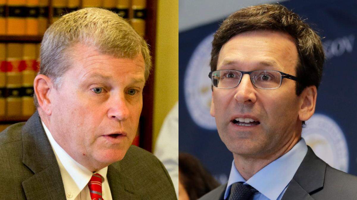 Idaho Attorney General Lawrence Wasden, left, and Washington Attorney General Bob Ferguson. On Tuesday, Ferguson submitted an amicus brief in support of a lawsuit filed by DOJ against Idaho’s near-total ban on abortion.