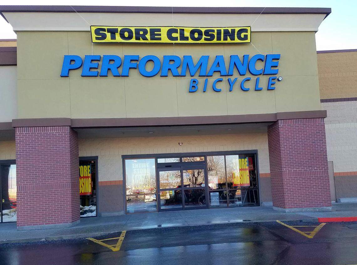 Signs announce a store-closing sale at Performance Bicycle in the Franklin Towne Plaza in Boise. Financial problems have caused the North Carolina company to file for bankruptcy and to shut down its 102 stores in 20 states. The Boise store is the only one in Idaho.