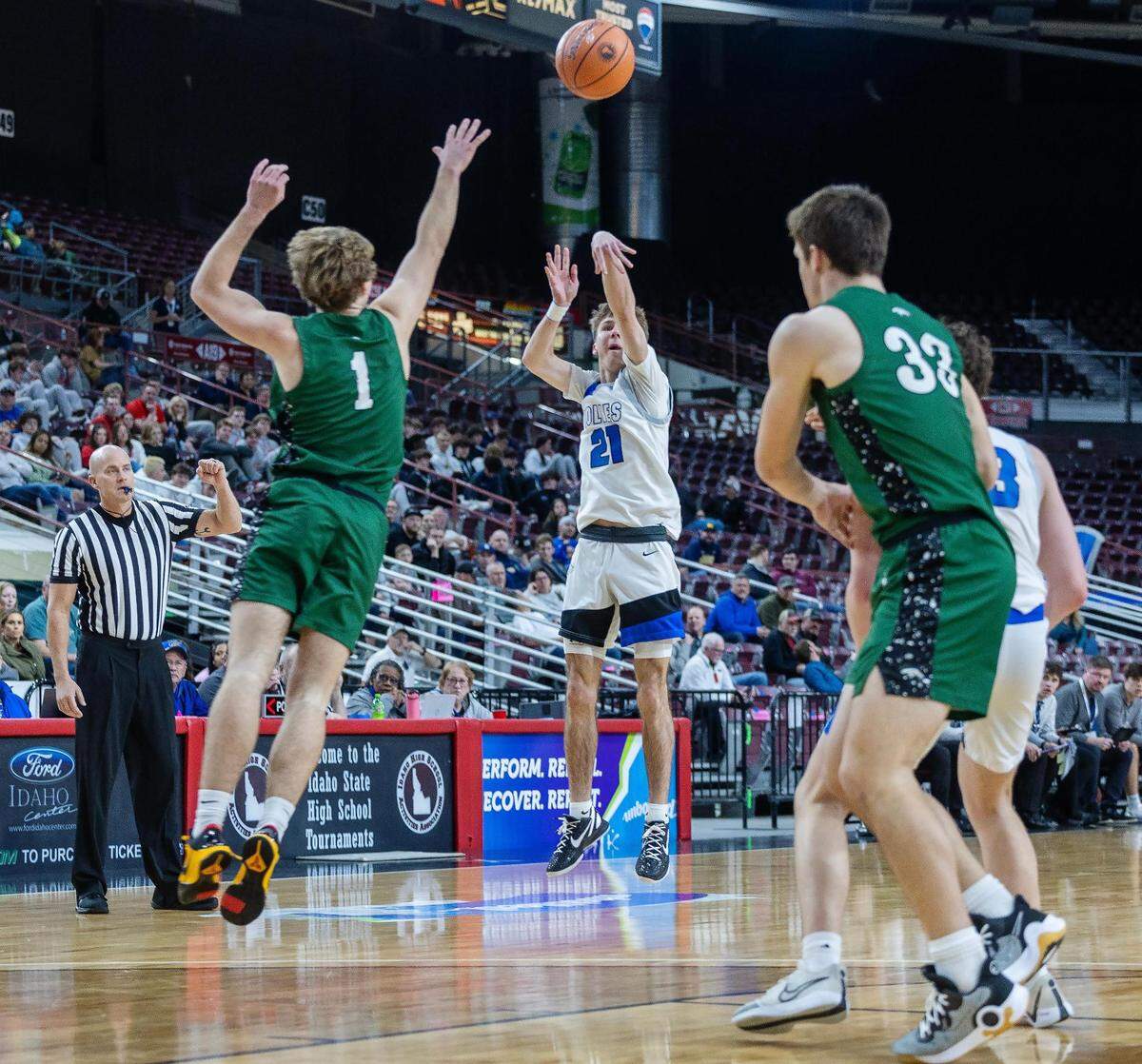 Timberline senior Ryan Buehler drained a pair of 3-pointers off the bench for the Wolves on Thursday.