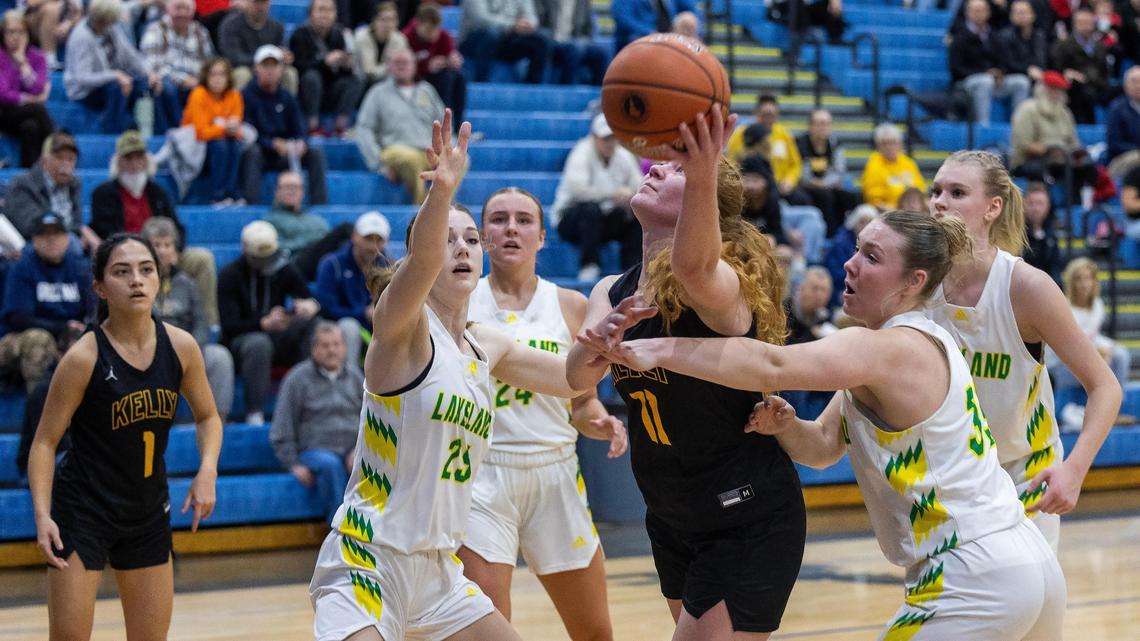 Bishop Kelly junior Mary Behrend shoots and scores in the second quarter of their first-round game at the 4A state tournament against Lakeland on Thursday at Timberline High School.