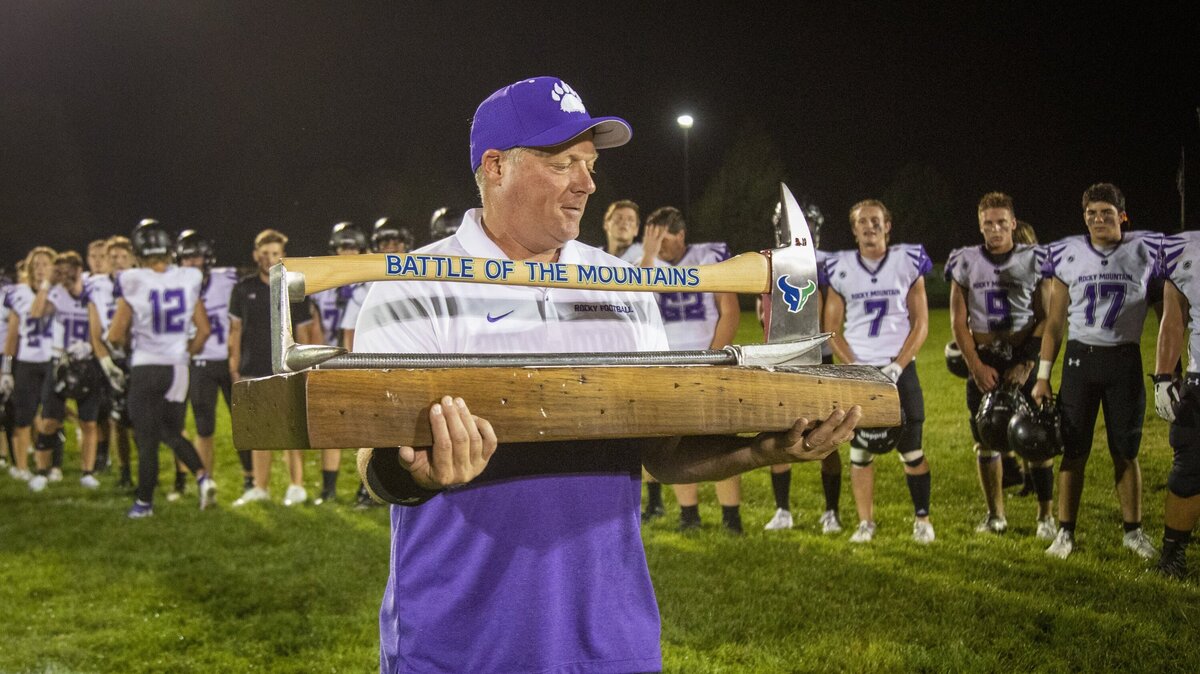 Bishop Kelly hired former Rocky Mountain coach Chris Culig to lead the Knights this fall. Above, Culig accepts the Battle of the Mountains rivalry trophy after beating Mountain View in 2019.