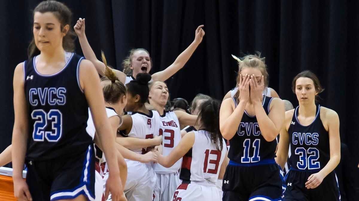 Cole Valley Christian leaves the court as Soda Springs celebrates a 67-56 victory in the 2A girls basketball state championship Saturday at Ford Idaho Center in Nampa.