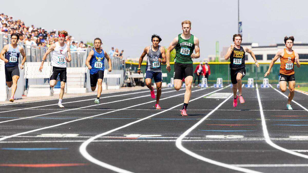 Gatlin Bair of Burley takes first place in the 4A boys 100 meters race at the 5A/4A state track and field championships held at Mountain View, Saturday, May 20, 2023.