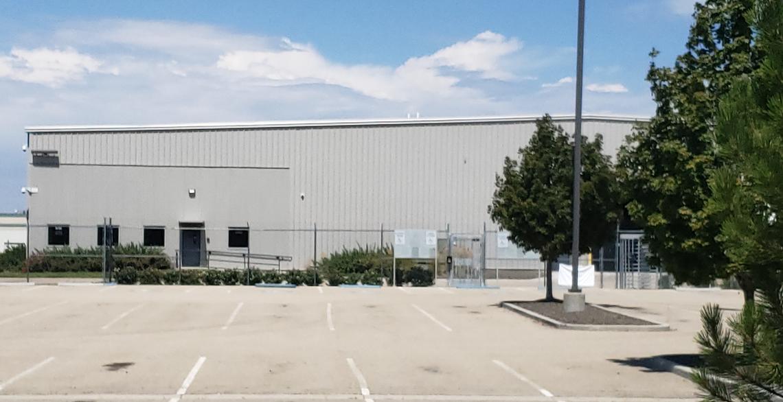 The warehouse, previously used by FedEx for its ground freight operation, has 79,567 square feet. The office, at left, has about 4,000 square feet.
