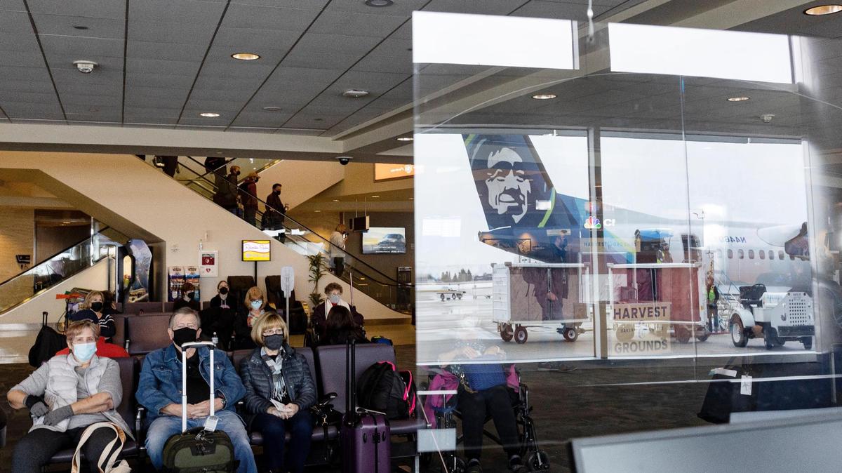 An Alaska Airlines plane is reflected in the Boise Airport terminal in January 2022. The Seattle-based air carrier is discontinuing its nonstop flight between Boise and Idaho Falls in mid-December.