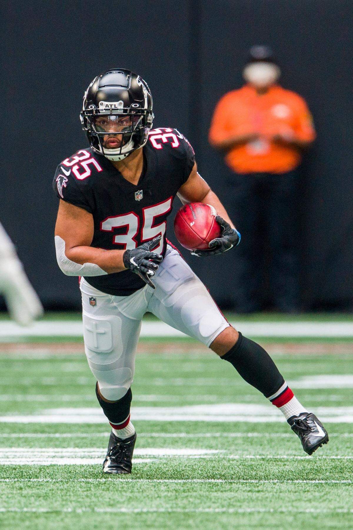 Atlanta returner Avery Williams returns a punt during the first half of an NFL football game Sunday against the Detroit Lions in Atlanta.