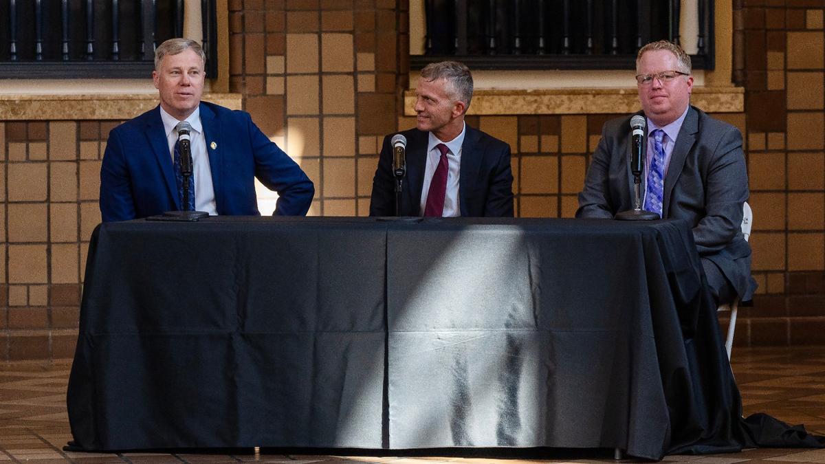 Candidates for the Boise police chief position Tom Worthy, left, Jeffrey Bert, center, and Chris Dennison answer questions during a forum held at the Boise Depot on July 18.