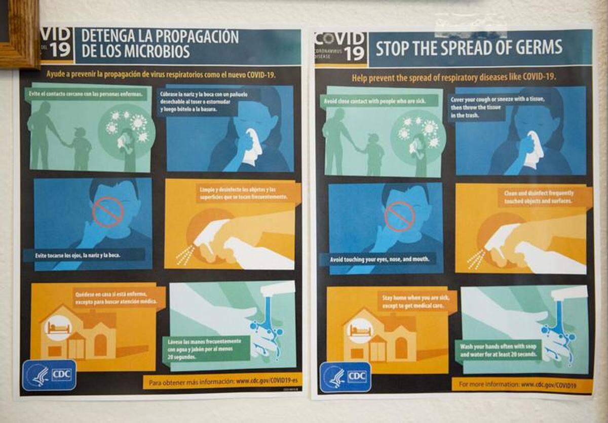 COVID-19 signs are posted in the lobby at South Central Public Health District in Twin Falls on Wednesday, Aug. 26, 2020.