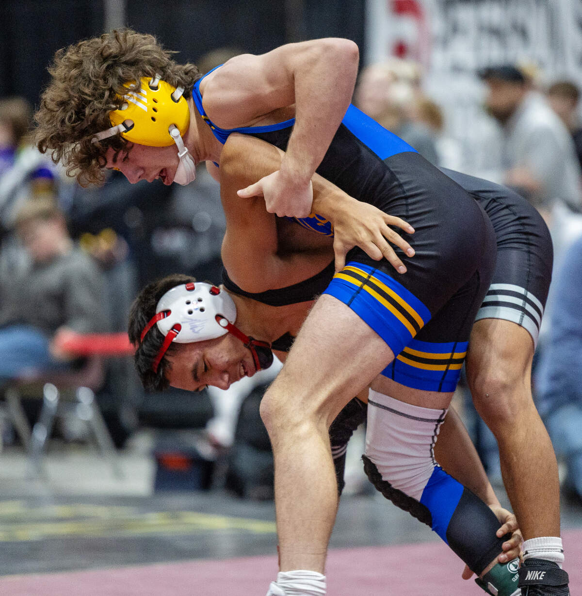 Caldwell’s Jaxson Freeman, top, enters as the top seed in the 6A 120-pound division.
