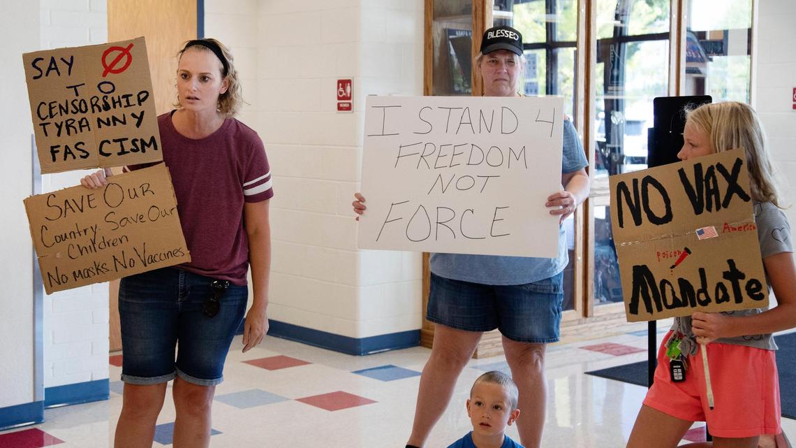 In this file photo, few protesters against COVID-19 vaccines and face masks for children stood outside of the Nampa High School gymnasium as Gov. Brad Little gave a speech. The Nampa School District’s superintendent announced her plans to resign in a letter Thursday.