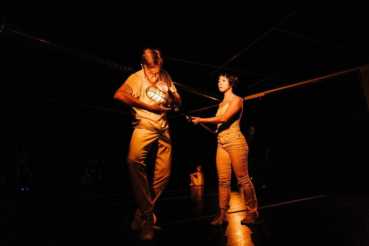 LED dancers Brett Perry, foreground, and Ching Ching Wong perform in LED’s “Ghost Notes” on Oct. 18. The company sold out five performances over the weekend.