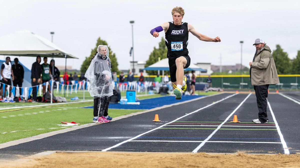 Timothy Price of Rocky Mountain takes first in the 6A boys triple jump Saturday at Mountain View High School.
