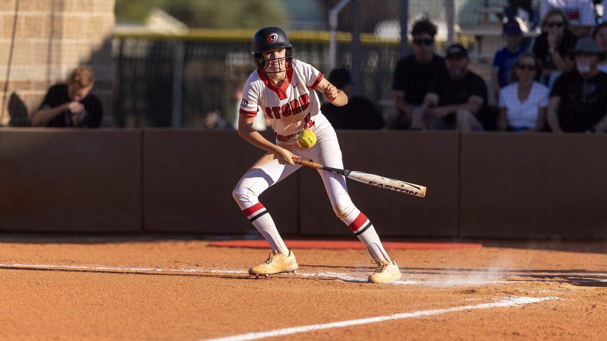 Owyhee sophomore Bristol Reeves bunts the ball in the second inning of their 6A District Three softball tournament semifinals game against Mountain View at Owyhee, Tuesday, May 5, 2026.