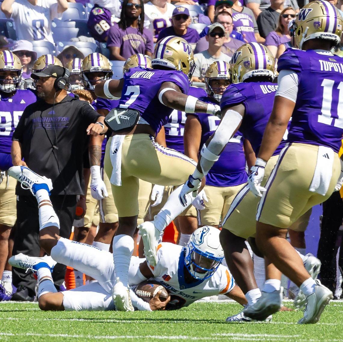 Boise State quarterback Taylen Green slides down after a run in the first half of Saturday’s game at Washington.