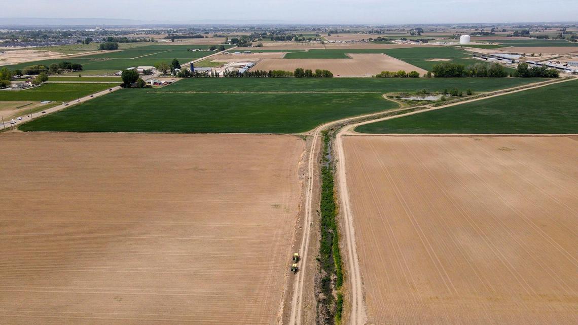 Looking west from Owyhee Storm Avenue toward Star Road in Meridian, farmland stretches for many acres.