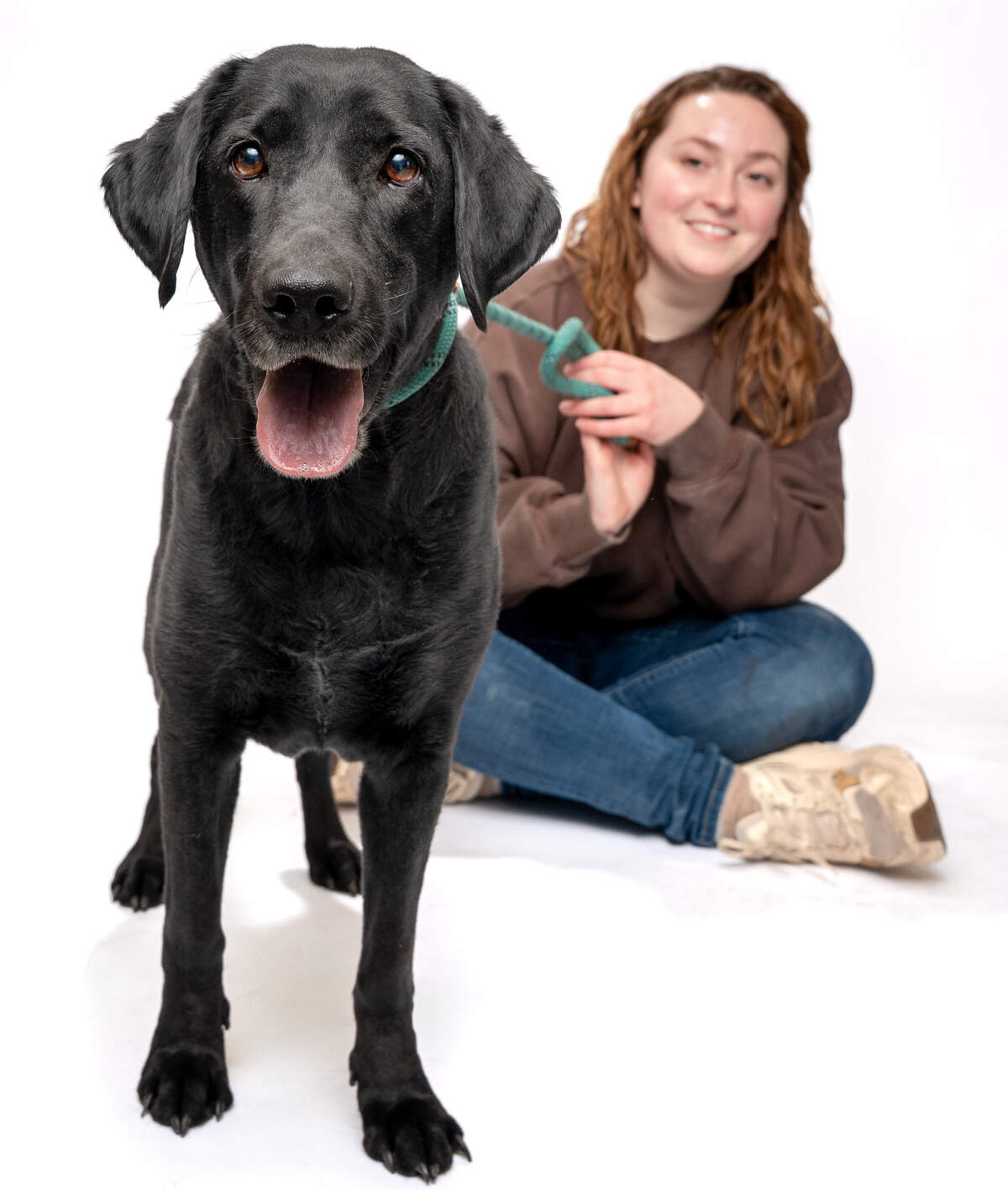 West Valley Humane Society employee Jess Boyd with a West Valley Humane Society dog named Mia.