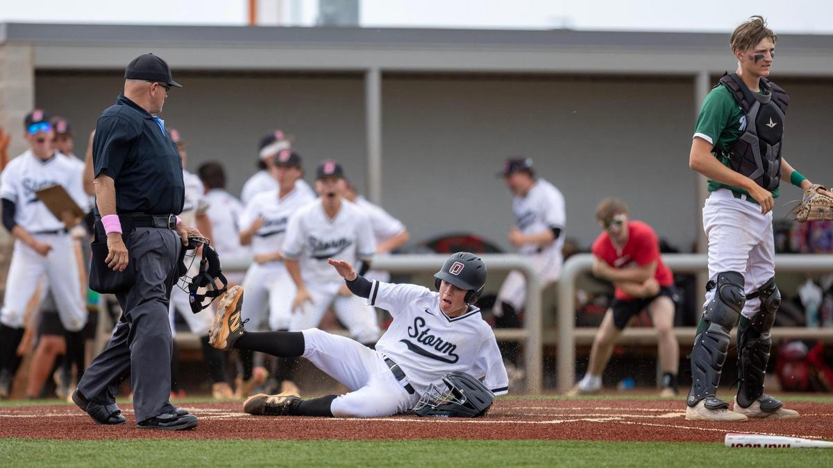 Owyhee's Jack Hallenbeck slides into home plate as part of a sixth-inning rally against Eagle in the 6A regionals last season. 