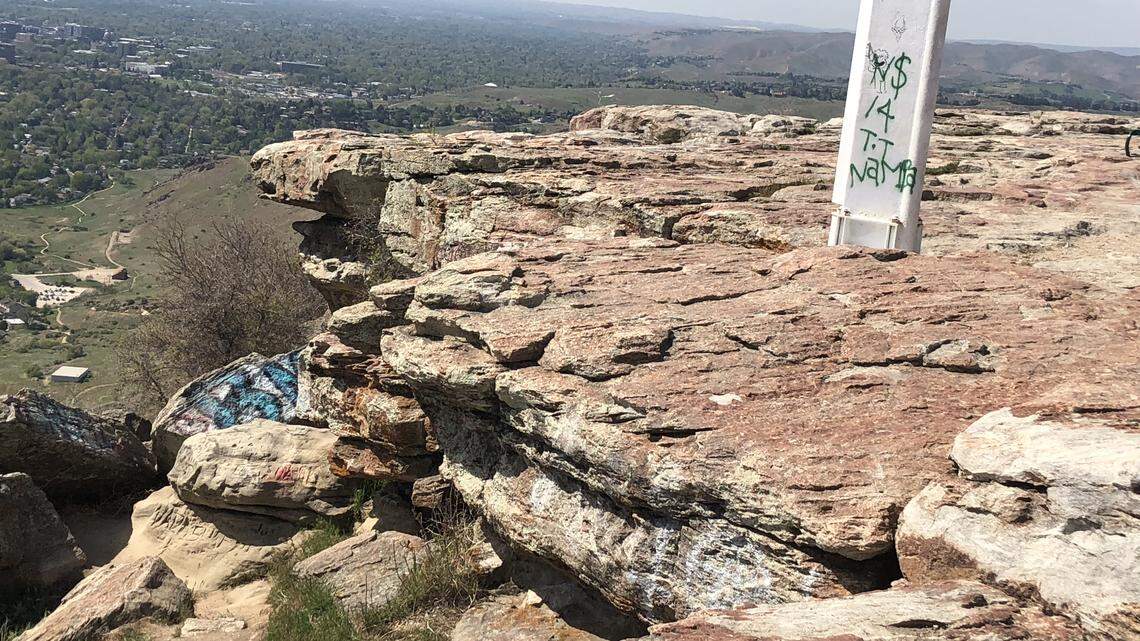 The base of the Table Rock cross is now tagged with graffiti. Vandalism has been an ongoing problem at the popular hiking area.