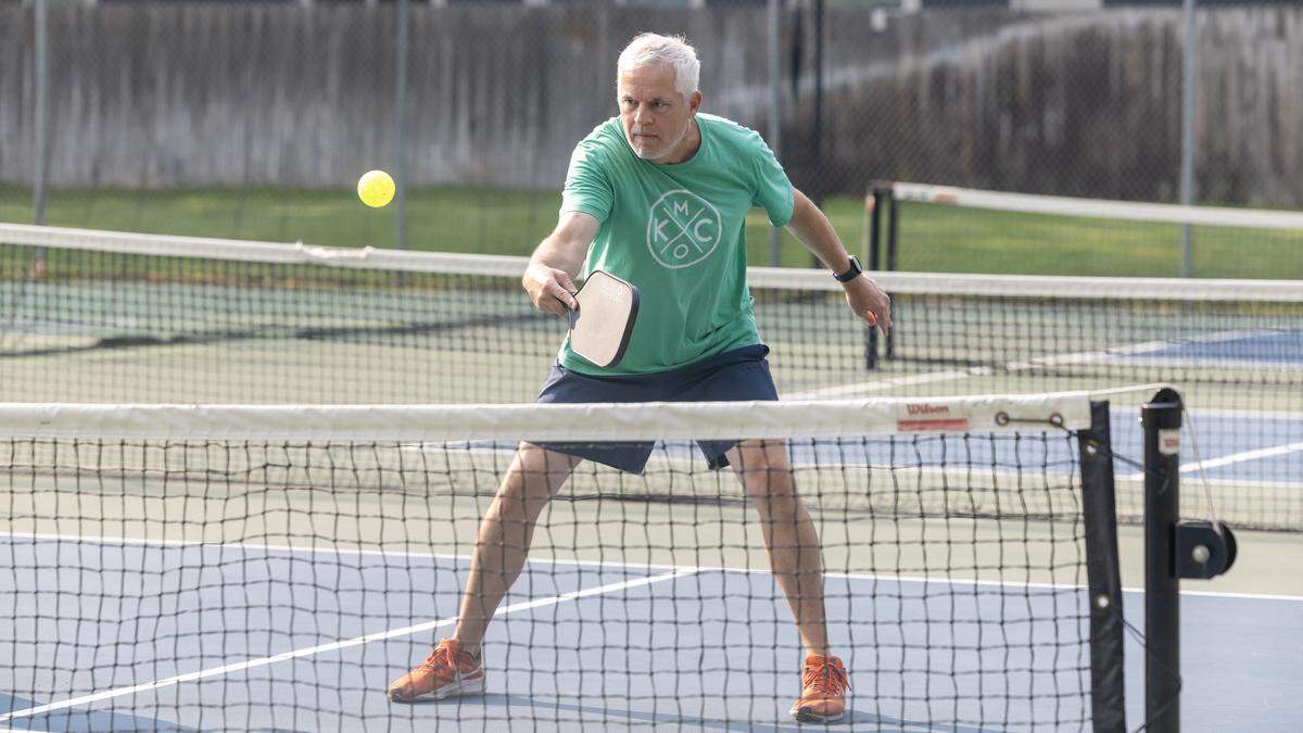 Chris Sallas plays pickleball Friday at the Manitou Park pickleball courts.