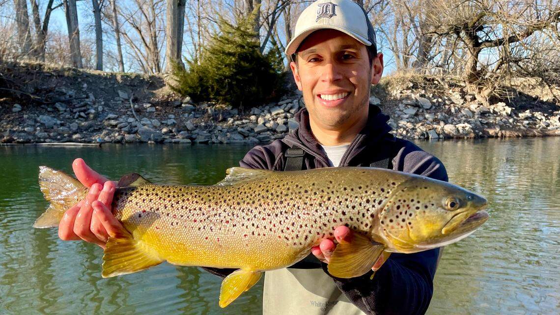 Braving Idaho’s chilly, wacky spring weather can pay off with awesome catches like this 23-inch Boise River brown trout, caught and released just days before the spring runoff arrived