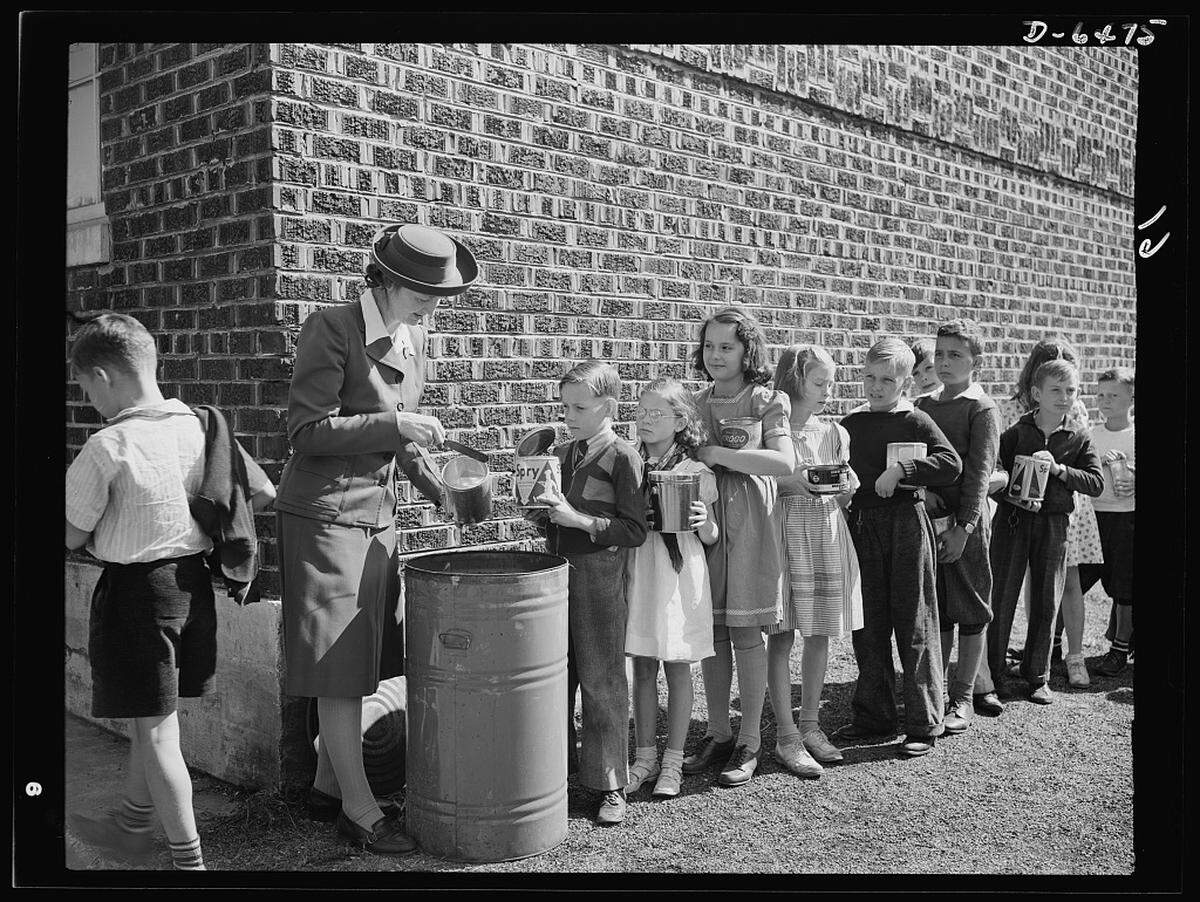 Students line up for a metal recycling drive during World War II. Americans on the home front were asked to do their part to help the war effort, and they responded.