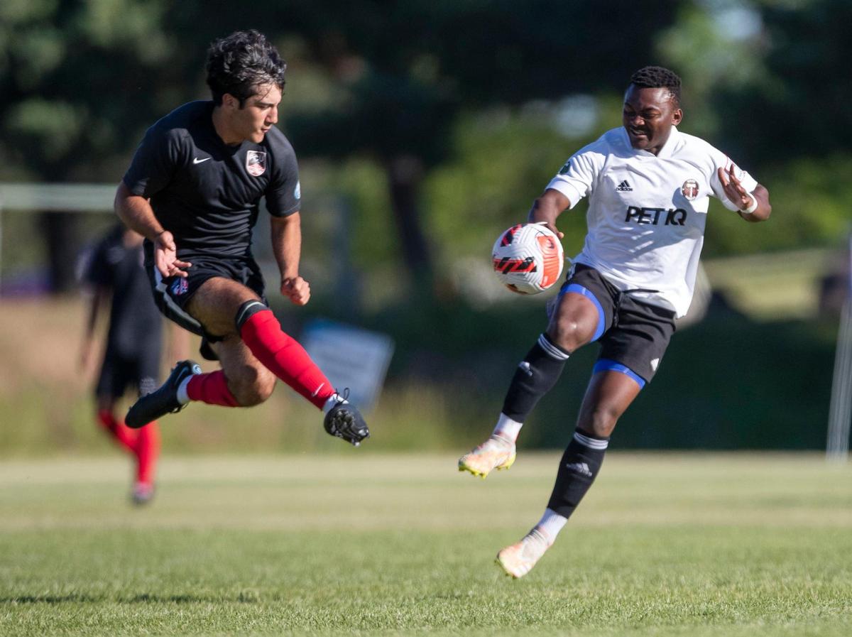Boise Timbers’ Lieven Ivanza pressures a Portland City United kick in the U-18 Boys semifinals of the U.S. Youth Soccer Far West Regional Championships, Saturday, June 25, 2022 at Simplot Sports Complex in East Boise.