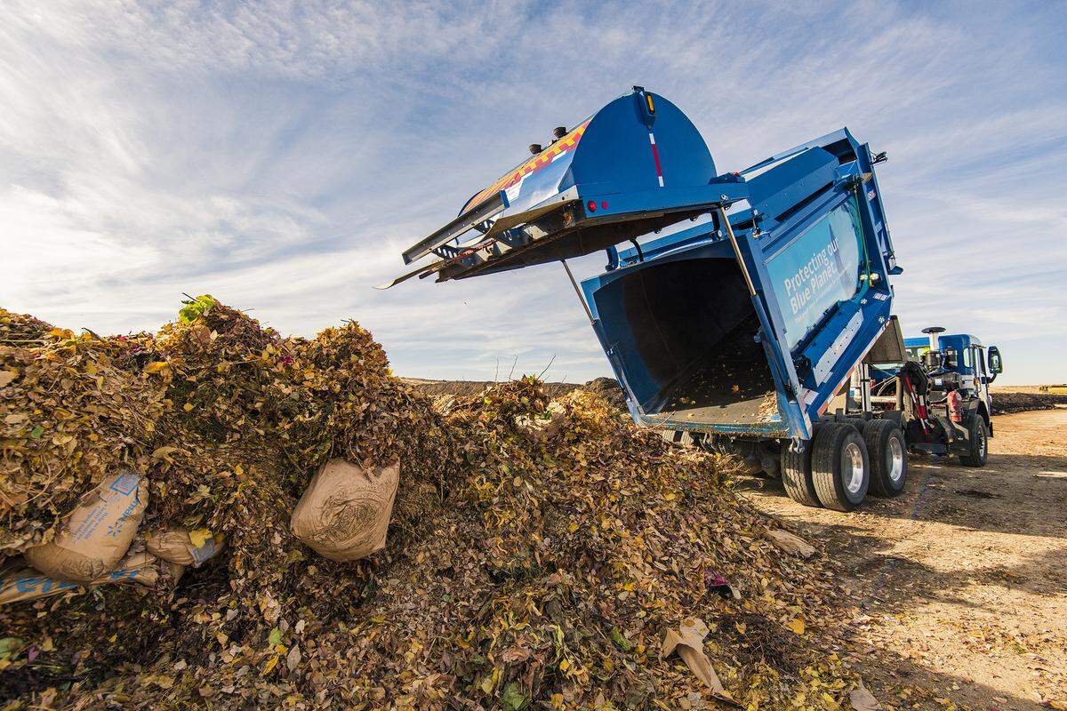 Yard waste and other compostable materials that residents toss into their composting bins are delivered to composting facility south of Boise. The piles of organics are manually screened for impurities upon arrival.