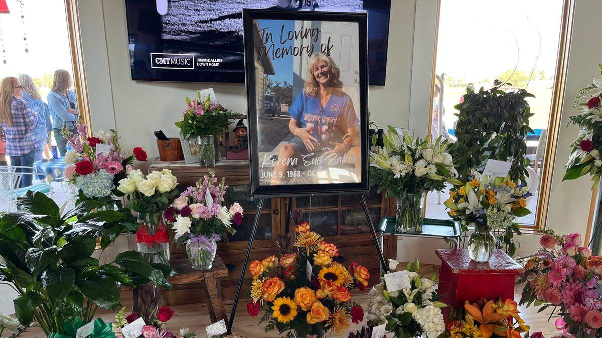 Attendees of Korena Baker’s celebration of life brought flowers and shared stories last October.